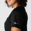 Force T-shirt med lommer i afslappet pasform til kvinder, der transporterer fugt