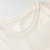 Tencel-skjorte med lomme, løse ærmer og rund hals til kvinder