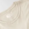 Tencel-skjorte til kvinder med løs pasform, rund hals og lomme