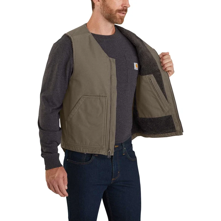 Vest til mænd i vasket duck-stof med robust sherpa-foring