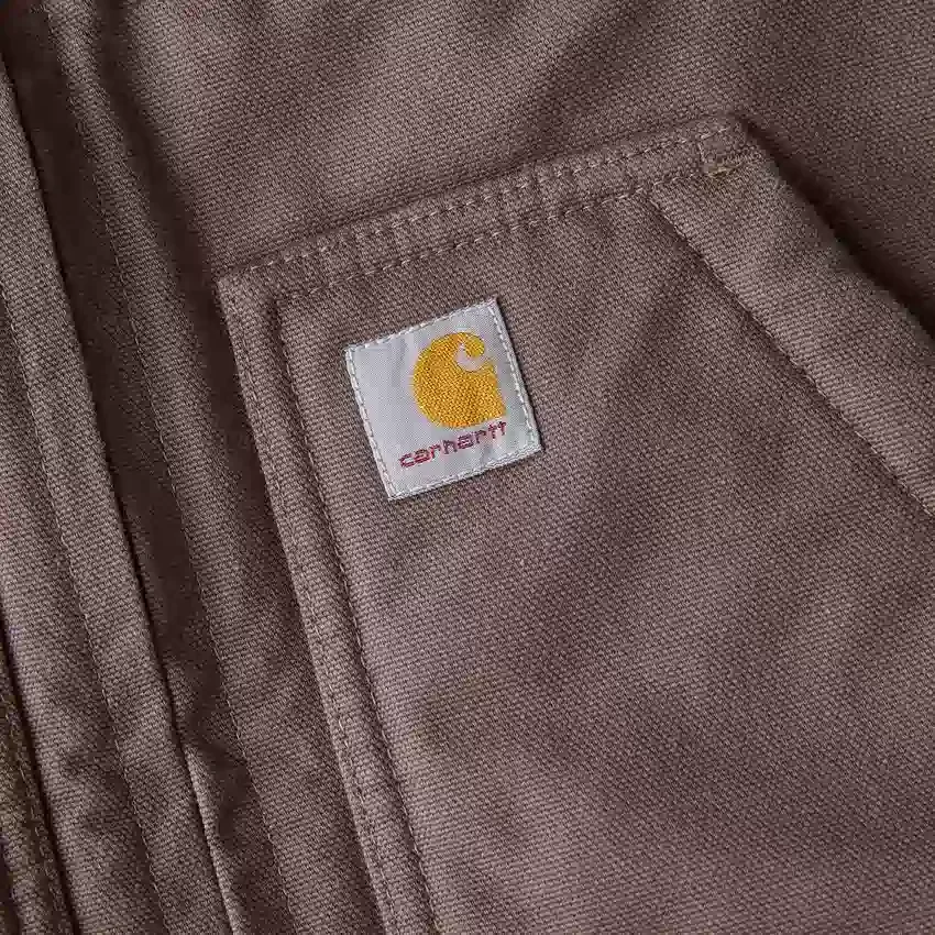 Veste til kvinder i vasket duck-stof med sherpa-foring og høj hals